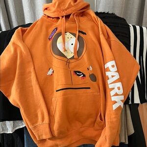 Orange Graphic Hoodie with Unique Design